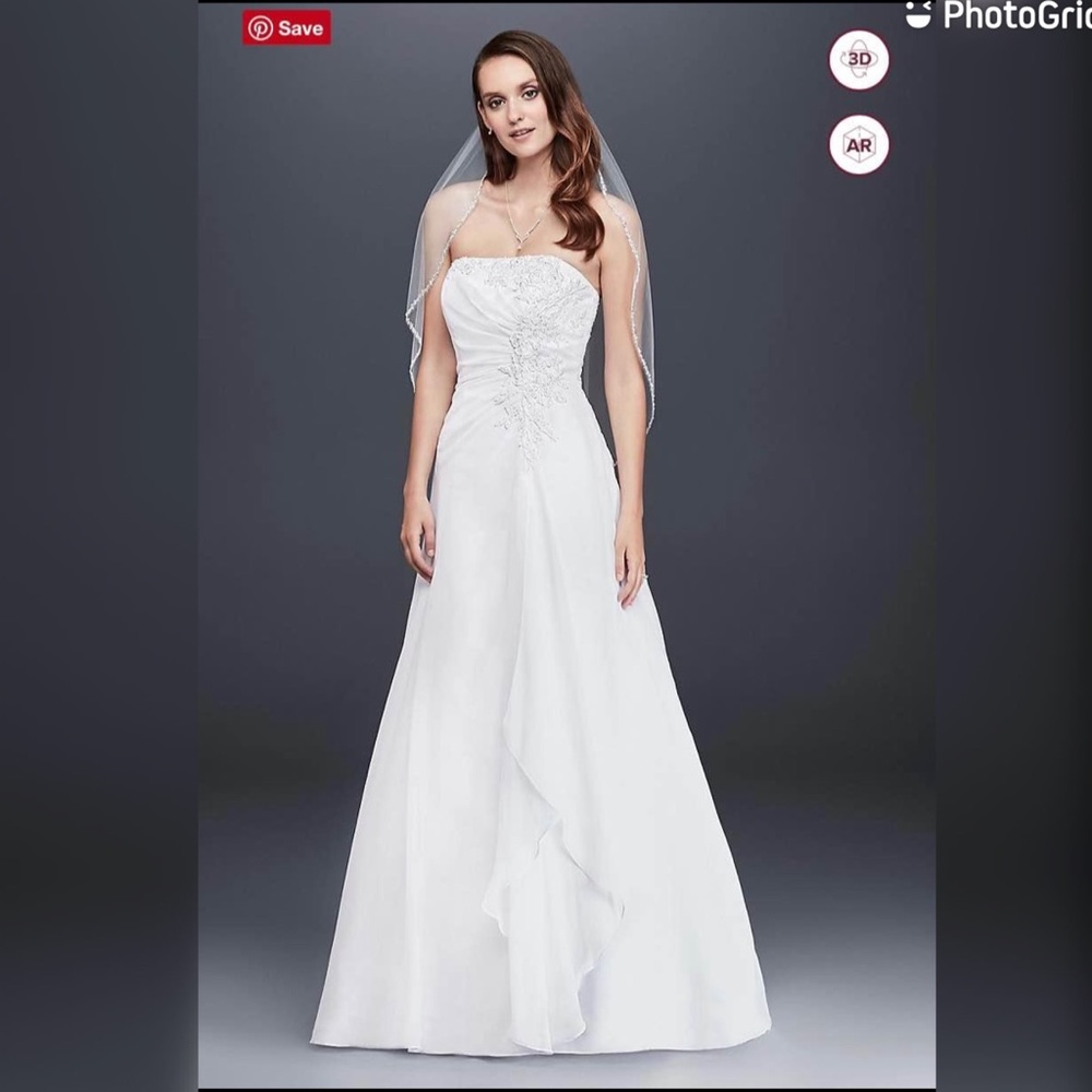 SIZE 18W: David’s Bridal wedding dress, never been worn, new with tag.